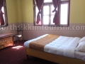 Lachung Hotel bedroom